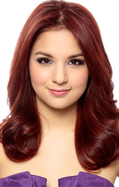 Rich burgundy red hair color on long smooth layered haircut.