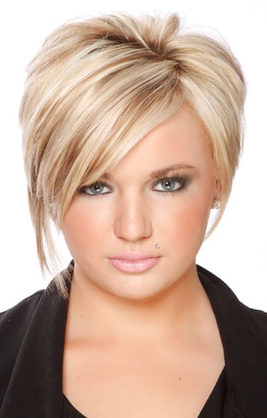 Dimensional blonde hair color on an a-line medium length pixie cut.